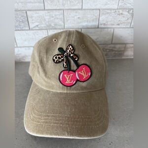 NWOT Tan Cap with leopard bow and  Cherries Embroidery